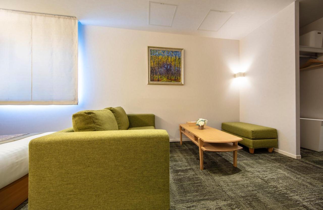 Grand Base Okayama Ekimae Aparthotel Luaran gambar