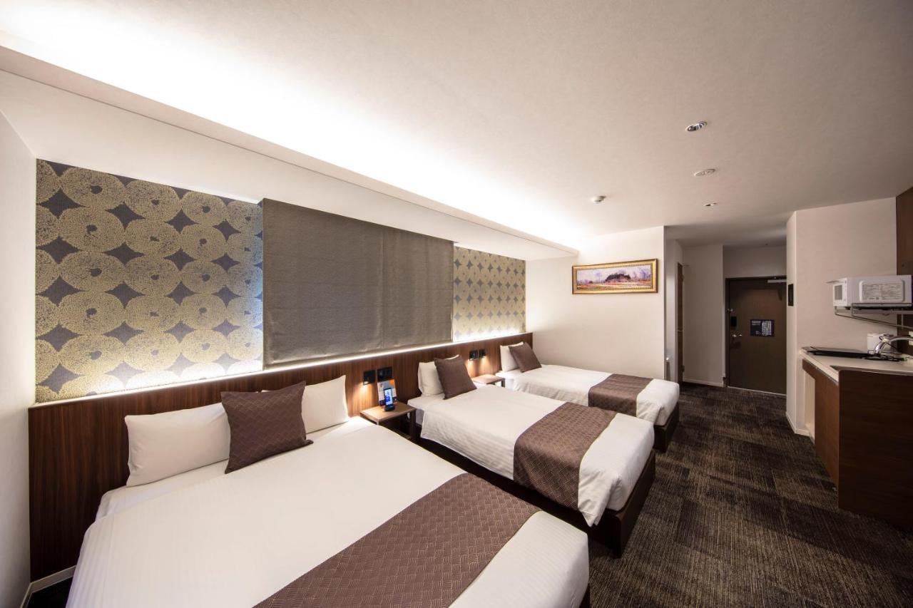 Grand Base Okayama Ekimae Aparthotel Luaran gambar