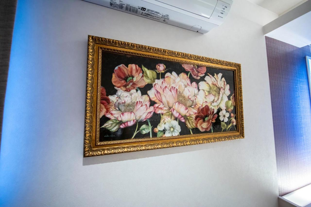Grand Base Okayama Ekimae Aparthotel Luaran gambar