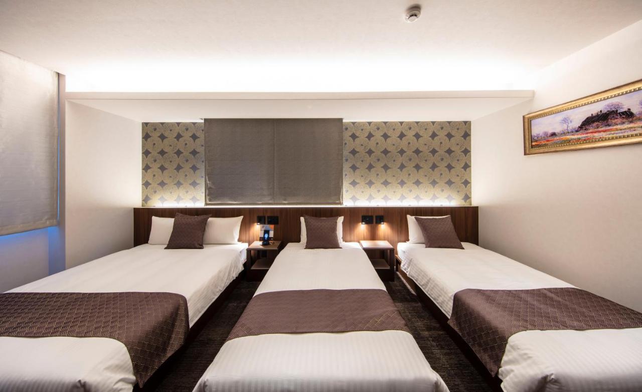 Grand Base Okayama Ekimae Aparthotel Luaran gambar