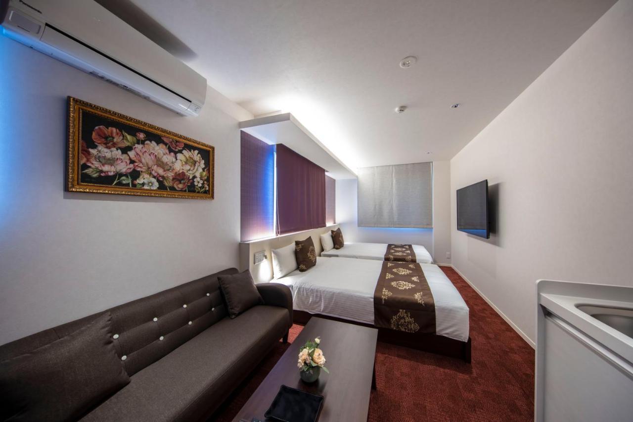 Grand Base Okayama Ekimae Aparthotel Luaran gambar