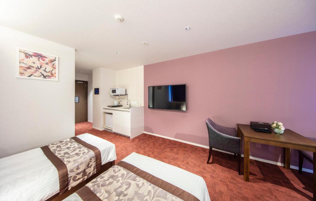 Grand Base Okayama Ekimae Aparthotel Luaran gambar