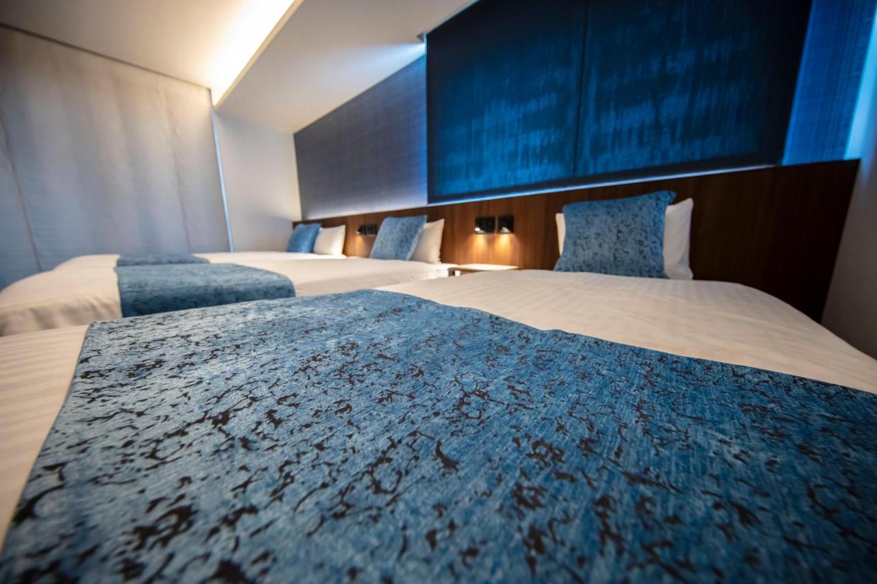 Grand Base Okayama Ekimae Aparthotel Luaran gambar