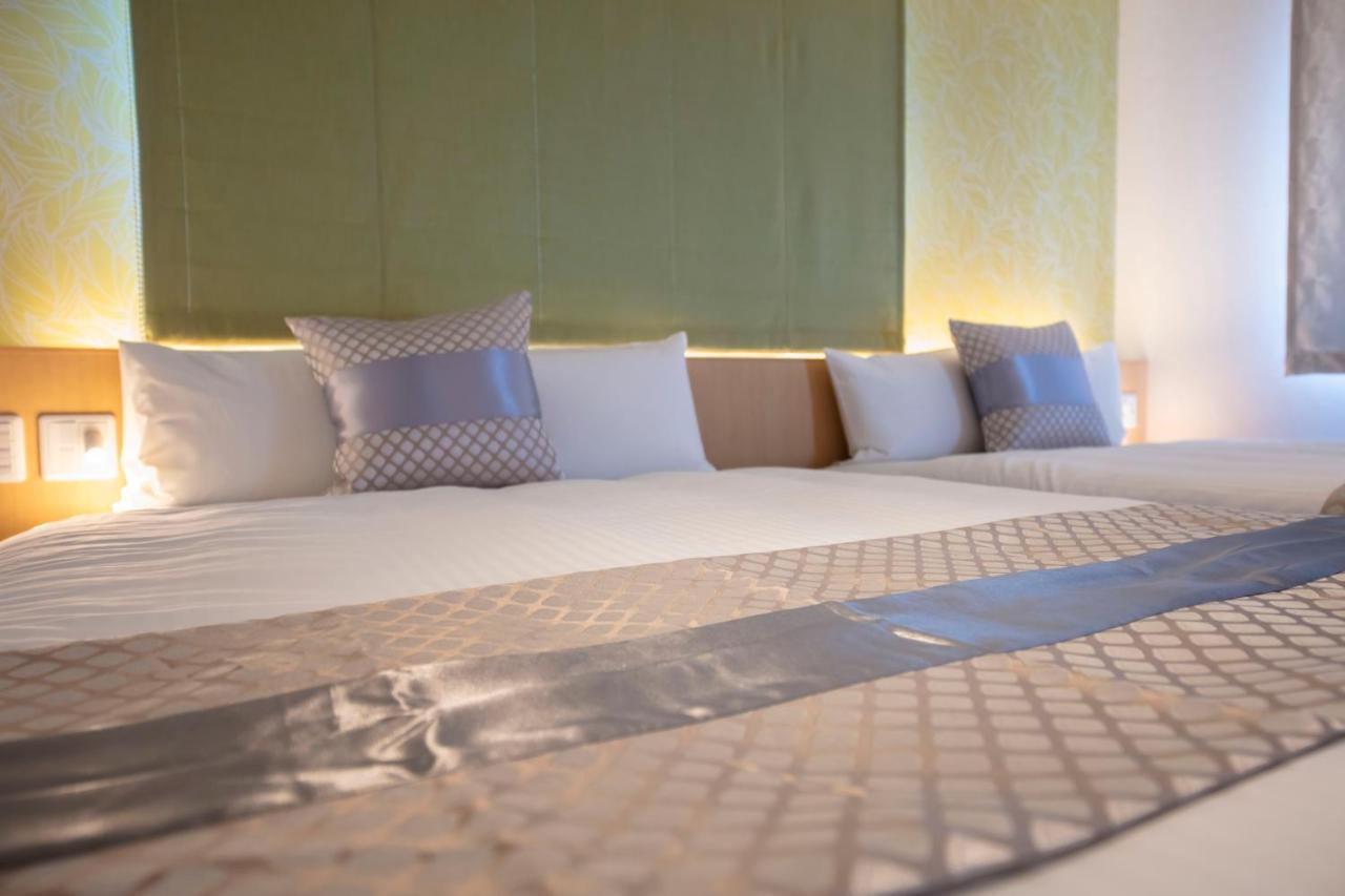 Grand Base Okayama Ekimae Aparthotel Luaran gambar