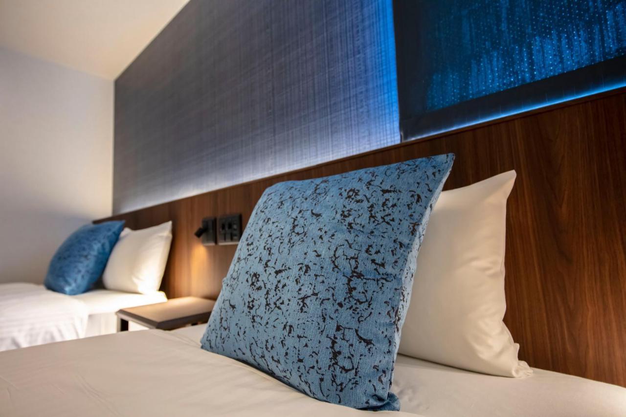 Grand Base Okayama Ekimae Aparthotel Luaran gambar
