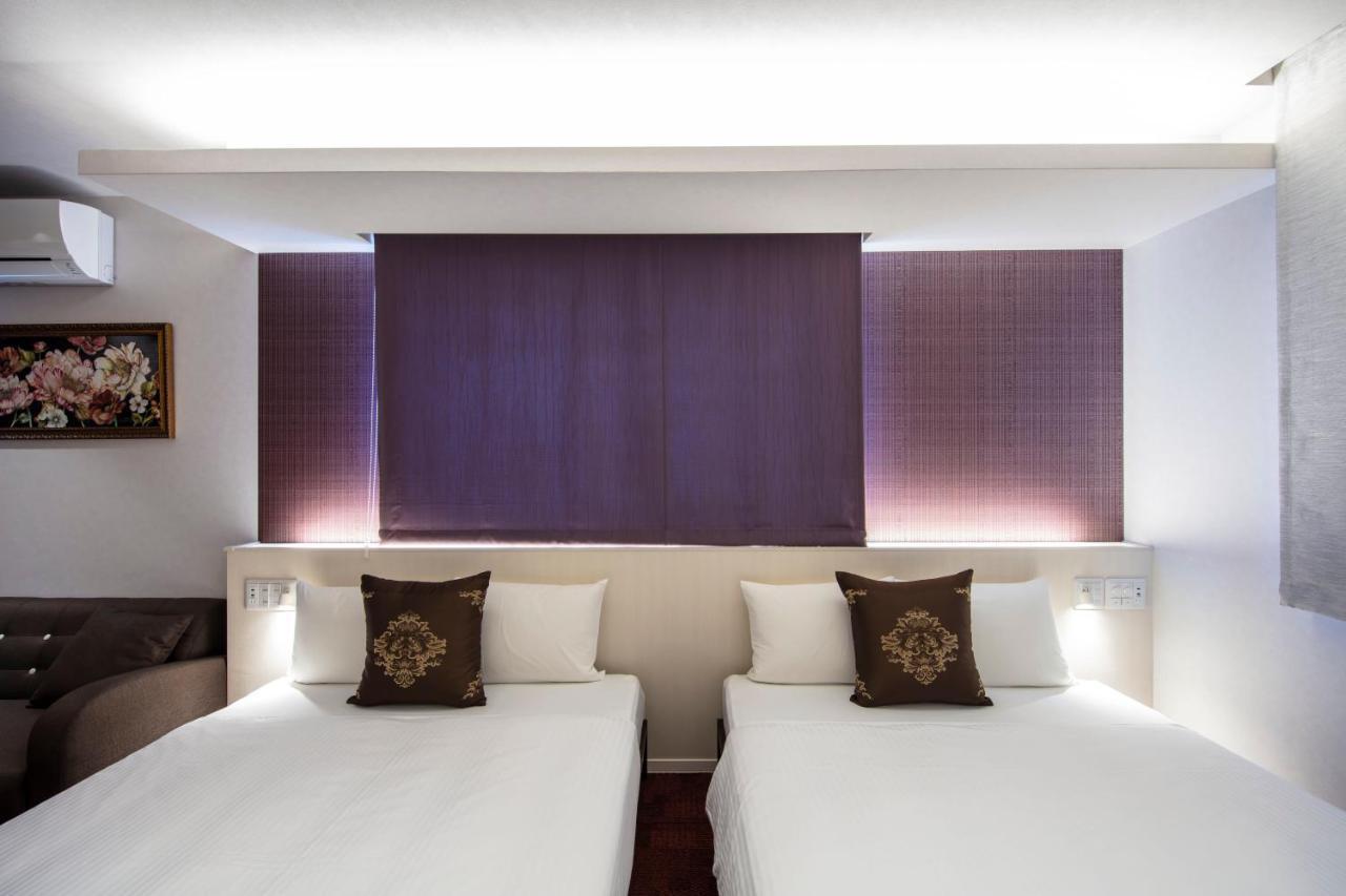 Grand Base Okayama Ekimae Aparthotel Luaran gambar