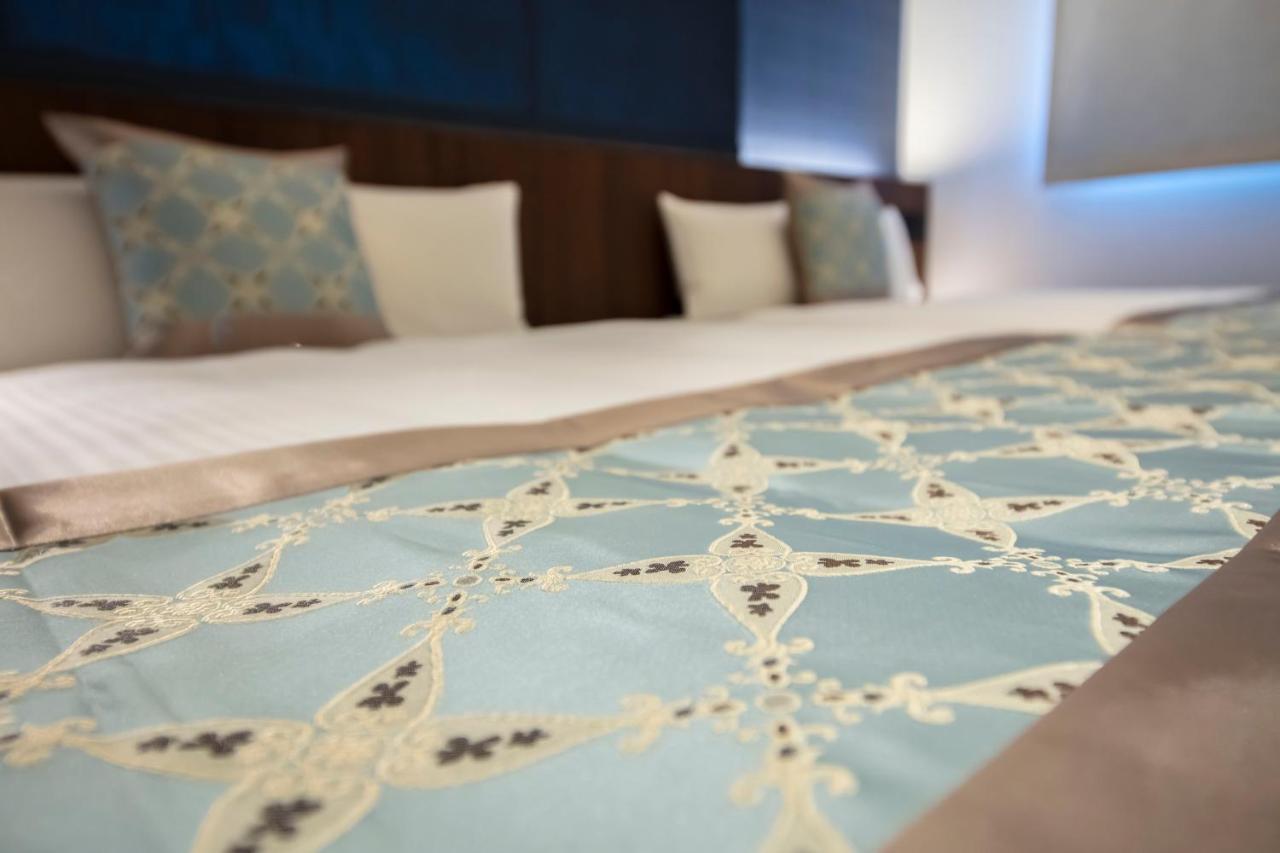 Grand Base Okayama Ekimae Aparthotel Luaran gambar