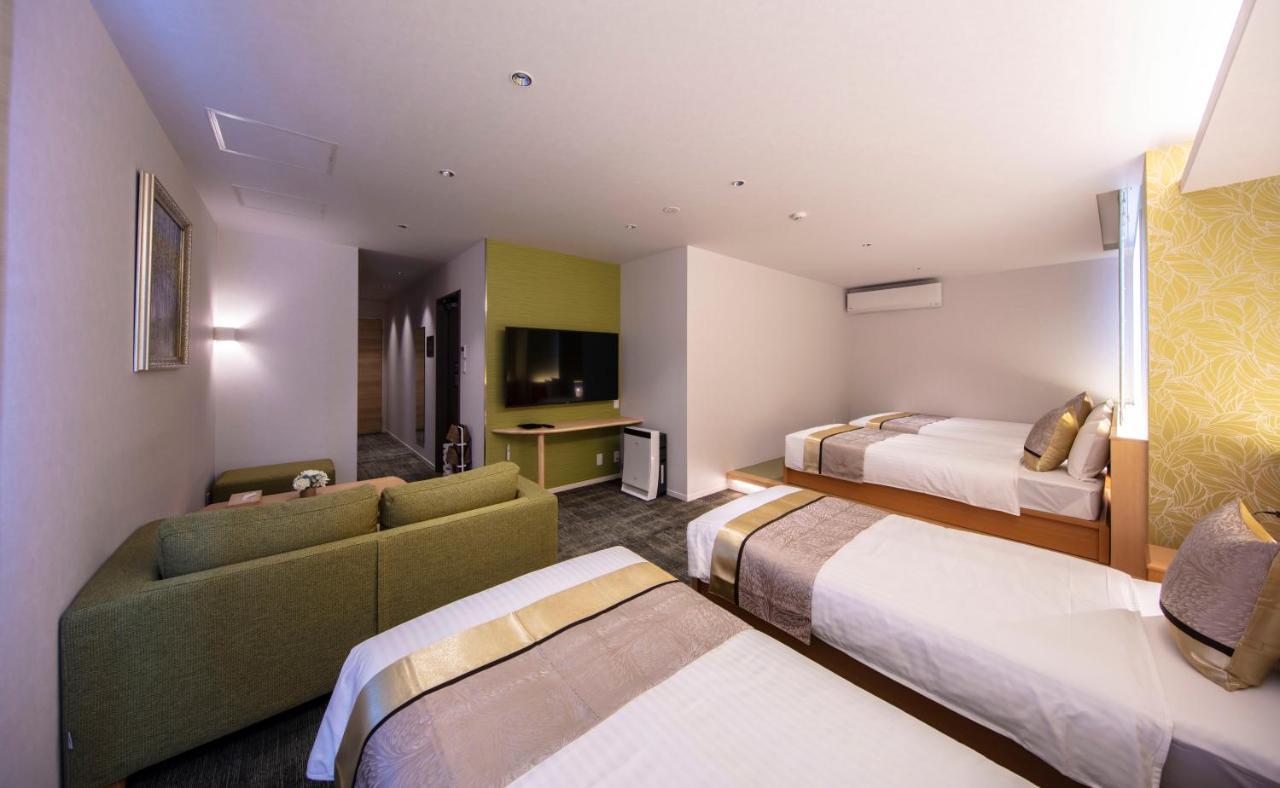 Grand Base Okayama Ekimae Aparthotel Luaran gambar