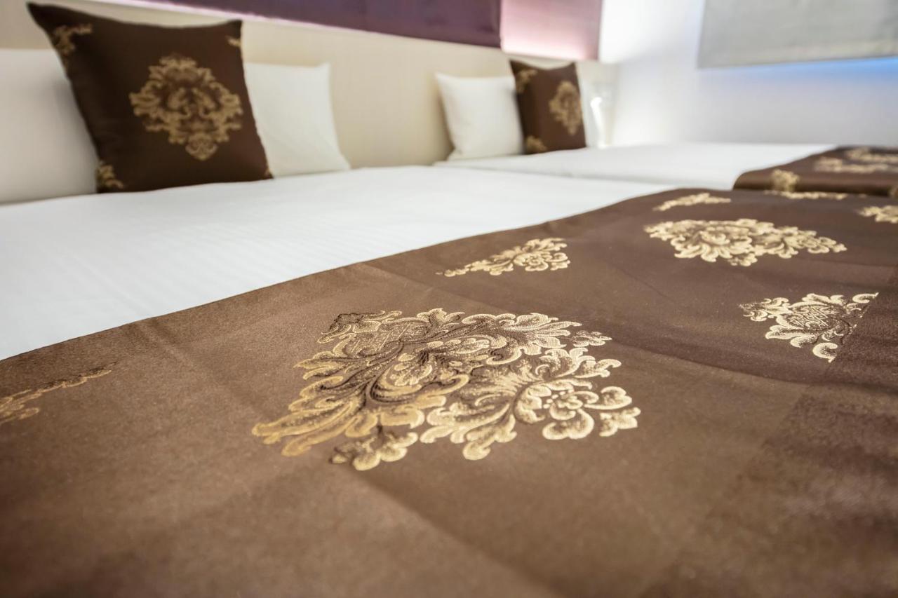 Grand Base Okayama Ekimae Aparthotel Luaran gambar