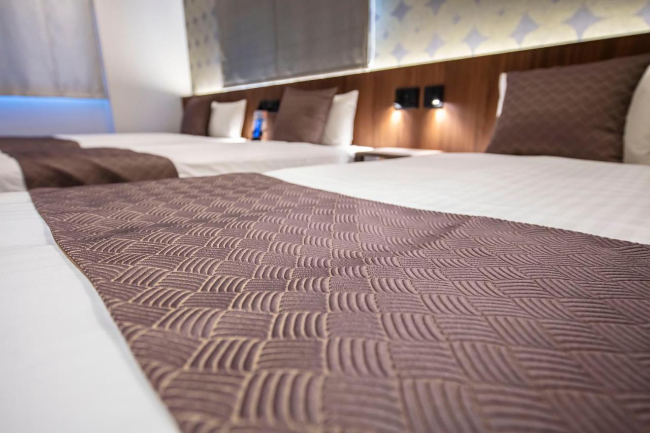 Grand Base Okayama Ekimae Aparthotel Luaran gambar