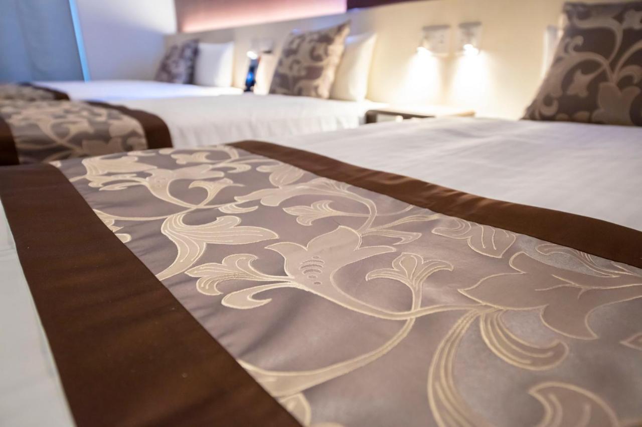 Grand Base Okayama Ekimae Aparthotel Luaran gambar