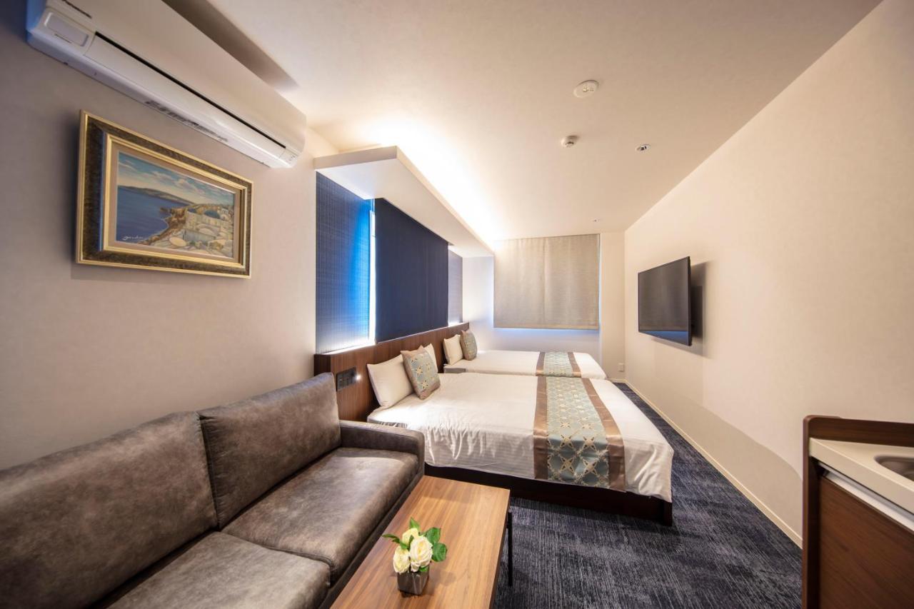 Grand Base Okayama Ekimae Aparthotel Luaran gambar