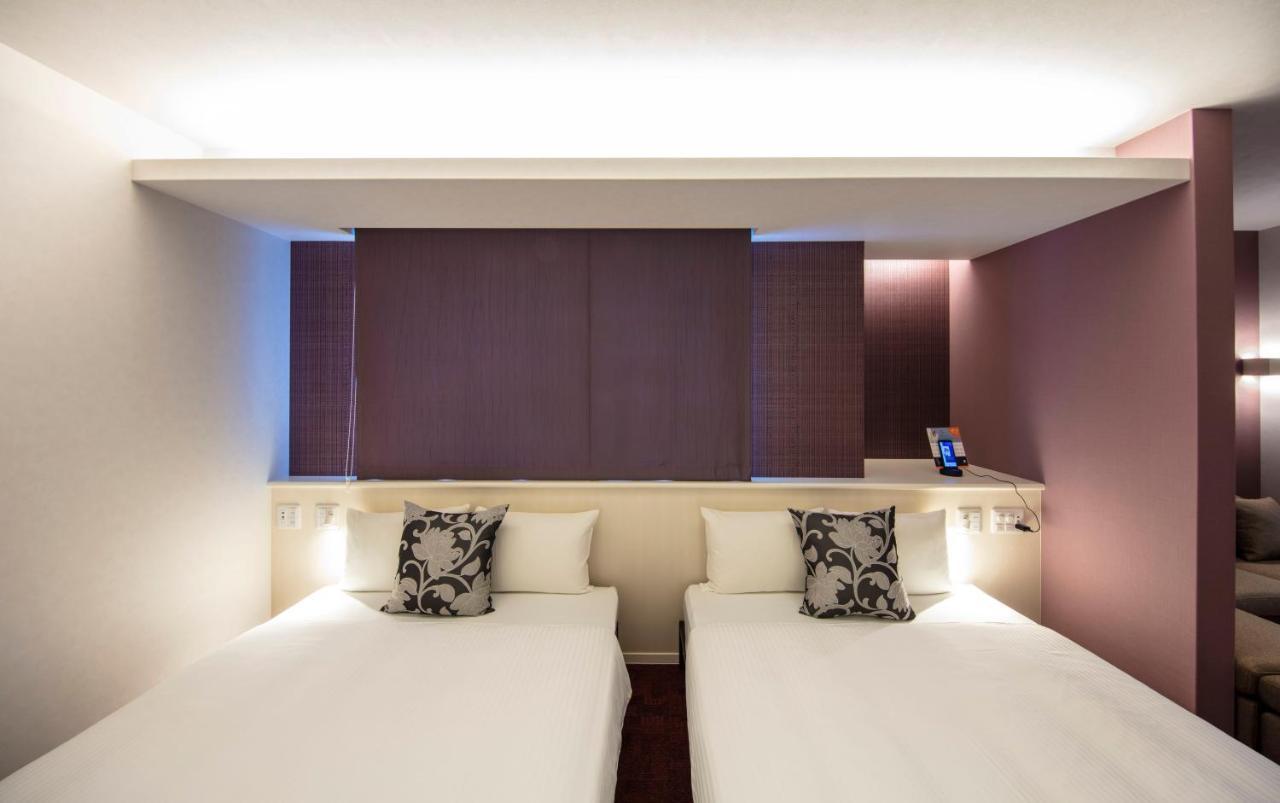 Grand Base Okayama Ekimae Aparthotel Luaran gambar